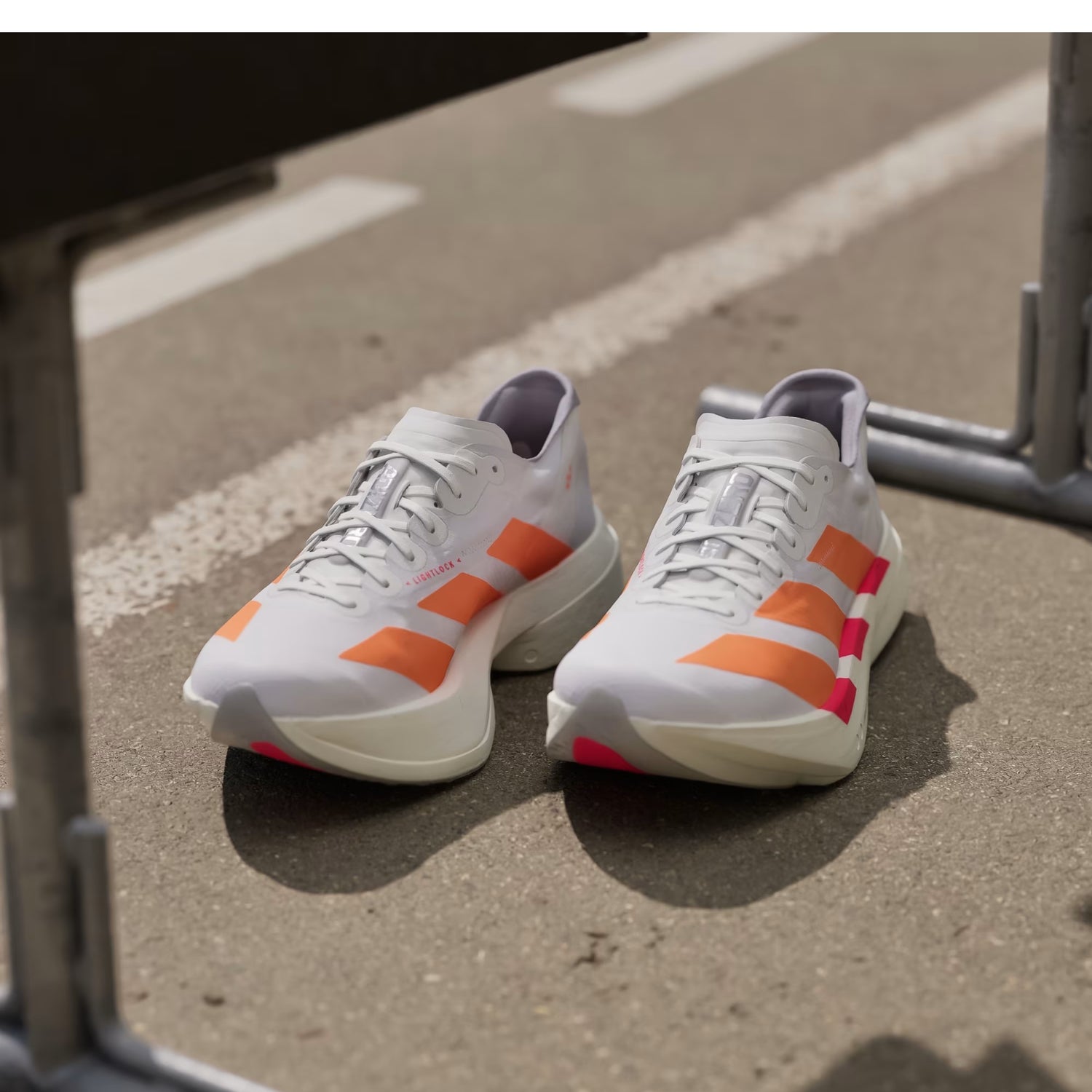 Adidas Adizero Adios Pro 4-
Cloud White / Lucid Orange / Lucid Red