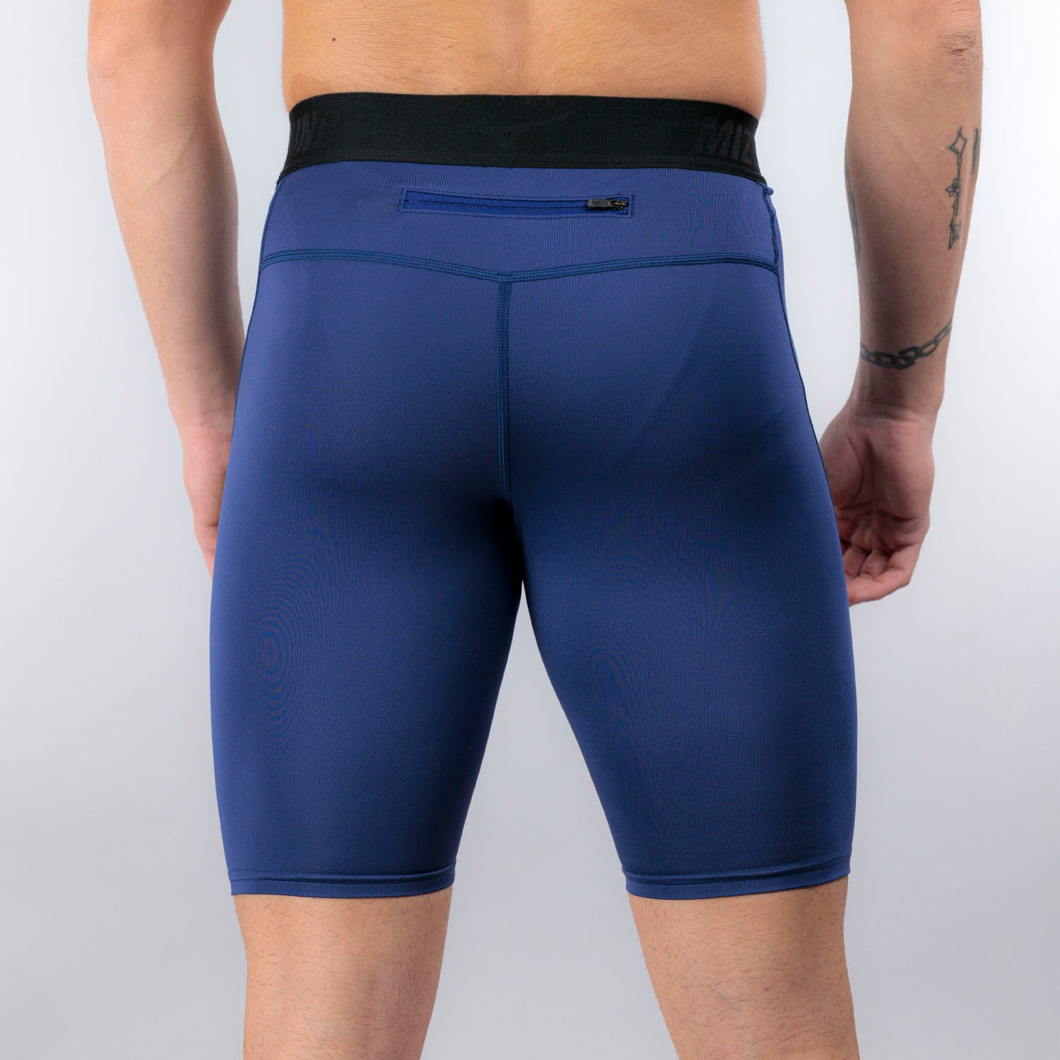 MIZUNO Core Impulse Mid Tight -Uomo
